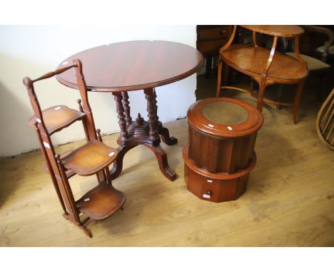 Mixed lot to include and Circular topped Table, a Folding Cake servier plus a Mahogany Commode which has original but cracked
