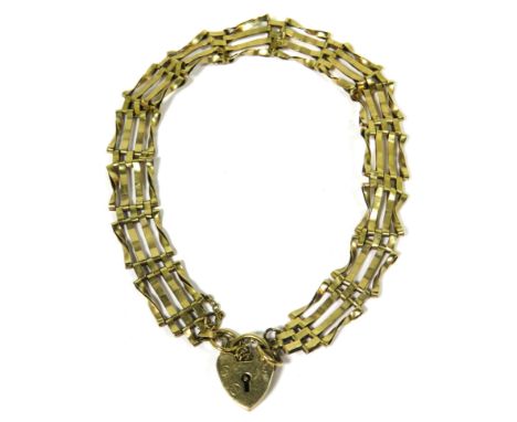 9ct Yellow Gold 7 inch Gate Bracelet set with a heart shaped padlock clasp with safety chain fitted. Total weight is 5.1g.
