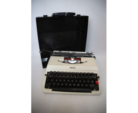 Imperial good Companion 203 Portable Typewriter with original carry case in working order. See photos. 