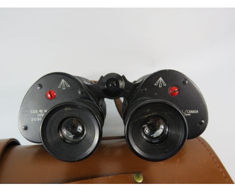 Pair of WW2 REL Canada military 7 x 50 binoculars with leather case, arrow marked and dated 1944.