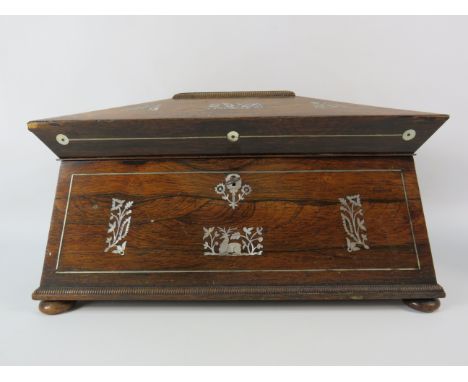 A 19th Century rose wood &amp; mother of pearl inlay tea caddy casket shape with glass bowl. 8" tall, 13" long and 7.5 deep.