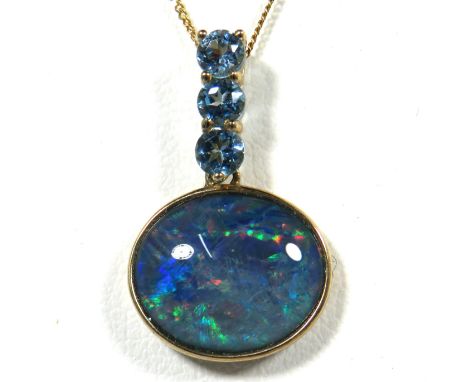 9ct Yellow Gold Pendant set with an oval Opal and Three Aquamarine coloured stones. Hung on a 9ct Yellow Gold 18 inch thin ch