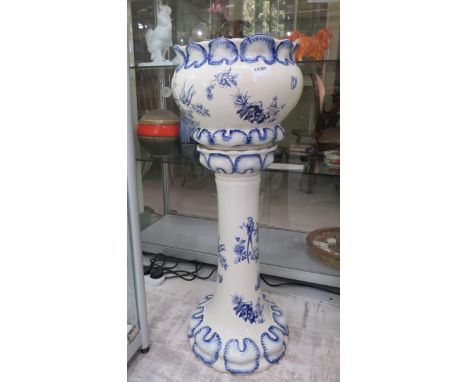 Blue and white ceramic jadiniere plant stand, 31.5" tall.