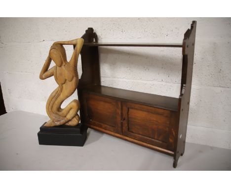 Oak Wall mounted shelf with cupboard plus abstract nude sculpture which stands 22 inches tall. See photos. 