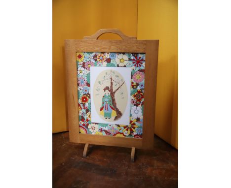 Oak constucted Oriental Style fire screen with ceramic insert to centre, Artists signature of R.T, Porter H:28 x W:19 inches.