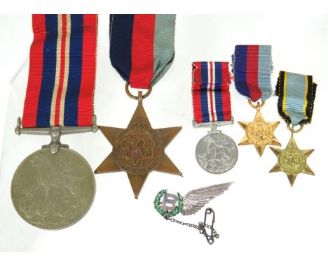 Selection of WW2 Medals plus Minature dress medals plus a Sterling Silver  Bomb Aimers Sweetheart badge which has Green ename