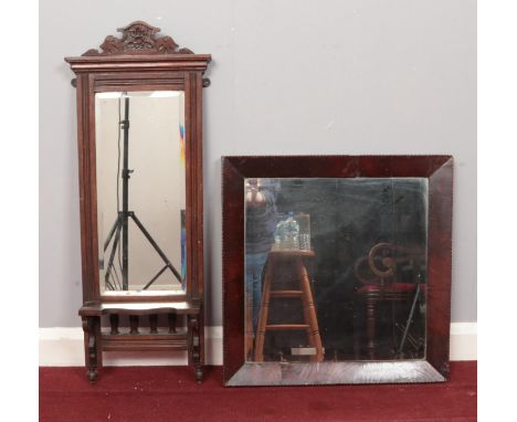 Two wall mirrors. To include an Edwardian carved mahogany mirror with shelf and a square rosewood veneered mirror with scallo