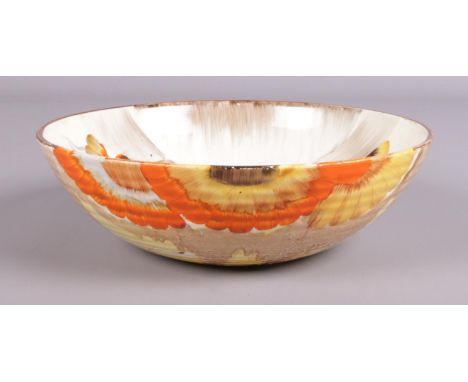 A Clarice Cliff ribbed bowl in the 'Rhodanthe' design. Marked Wilkinson LTD to base. (20cm diameter)  Damaged to centre of bo