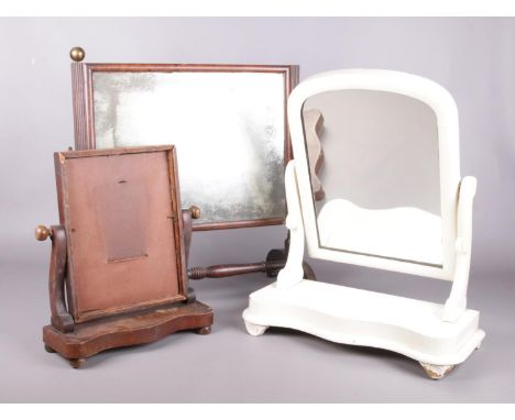 Three mahogany swing dressing table mirrors. To include a Victorian white painted mirror and a smaller example without the mi