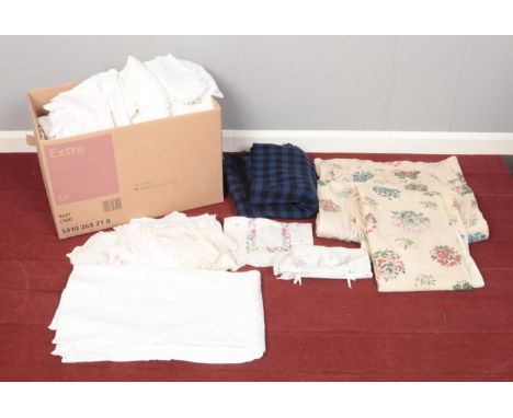 A large collection of vintage fabric and linens. To include a pair of floral lined curtains (161cm drop x 96cm width), tablec