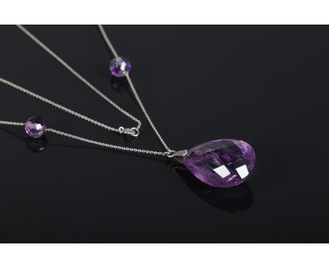 An Art Deco white metal and amethyst sautoir necklace. Length approximately 98cm.  