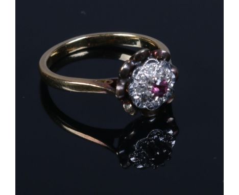 A vintage 18ct gold ruby &amp; diamond cluster ring. Size K, 3.39g.  
