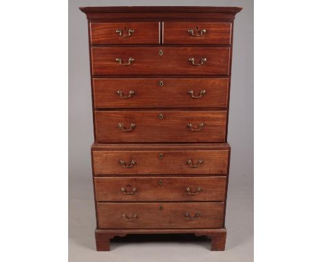 A George III mahogany and pine chest on chest. With moulded cornice and bracket feet. Height 182cm, Width 103cm, Depth 58cm. 