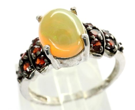 925 silver ring set with an opal and garnet cluster, size O, 2.7g. P&amp;P Group 1 (£14+VAT for the first lot and £1+VAT for 