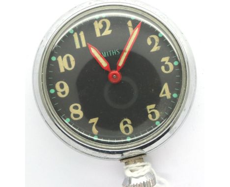 Smiths black face bottom wind car clock with magnetic back, D: 45 mm, working at lotting. P&amp;P Group 1 (£14+VAT for the fi