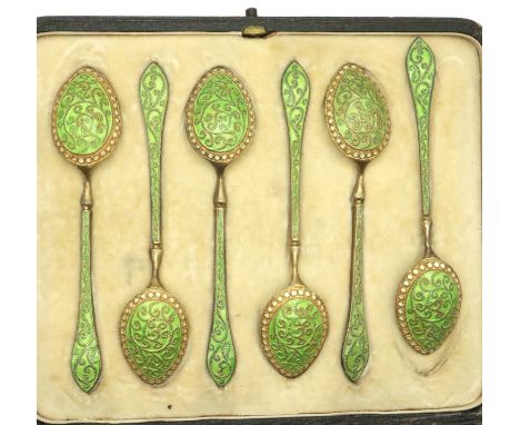 Six ornate enamel spoons, boxed. No damage/repair to enamel, only makers are STG meaning sterling. P&amp;P Group 1 (£14+VAT f
