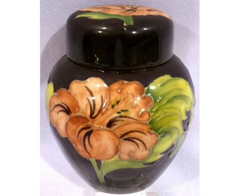 Moorcroft lidded ginger jar in the Clematis pattern, H: 12 cm. No cracks, chips or visible restoration. P&amp;P Group 1 (£14+