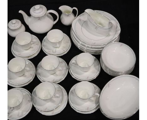 Forty seven piece Royal Doulton dinner service in the Carnation pattern. No damages, some light usage marks. Not available fo