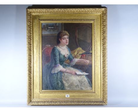 GEORGE WELLS oil on canvas - portrait of a seated elegant young lady at a dressing table with letter in her hand, signed and 