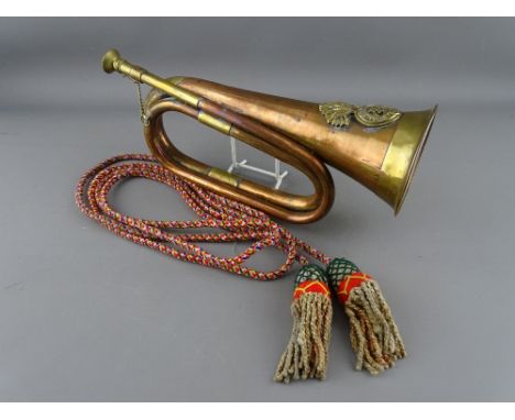 A COPPER &amp; BRASS ROYAL WELCH FUSILIERS MILITARY BUGLE with tasselled cord 'Royal Welch Fusiliers 23'