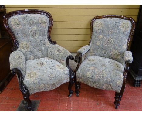 A VICTORIAN BUTTON UPHOLSTERED SPOONBACK ARMCHAIR and one other in matching upholstery, 106 cms high, 73 cms wide, 53 cms sea