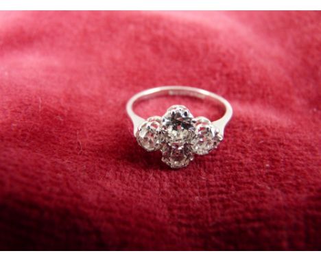 A FINE QUALITY EIGHTEEN CARAT WHITE GOLD &amp; PLATINUM FOUR STONE DIAMOND DRESS RING, visual estimate 1.5 carats, near clean