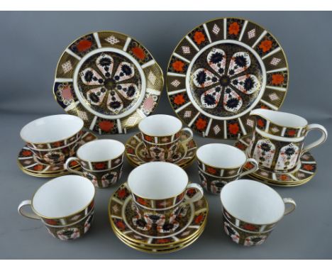 TWENTY TWO PIECES OF ROYAL CROWN DERBY '1128' TEAWARE comprising a 26.5 cms diameter plate, a 24.75 cms sandwich plate, six 1