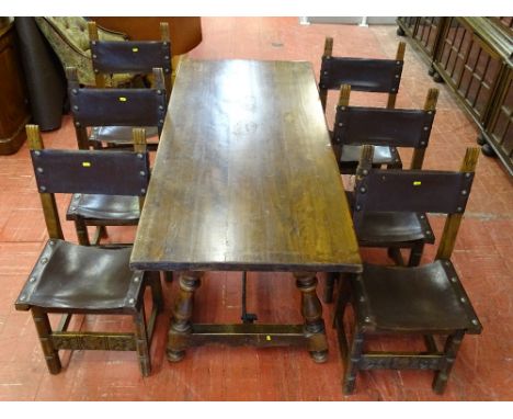 A REPRODUCTION REFECTORY STYLE DINING TABLE &amp; six leather seat and backed chairs having large metal button studding, 76 c