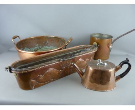 FOUR ANTIQUE COPPER KITCHEN ITEMS including a French fish poacher with iron swing handle, embossed fish and turreted crown cr