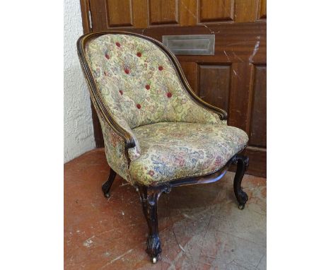 A VICTORIAN CARVED WALNUT SALON CHAIR with button back upholstery, 85.5 cms high, 58 cms wide, 48 cms seat depth