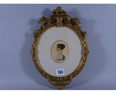 A SMALL PROFILE HEAD &amp; SHOULDERS PORTRAIT STUDY OF A LADY in a gilt gesso frame, 8 x 6 cms, 29.5 x 20 cms overall, 'Hay &