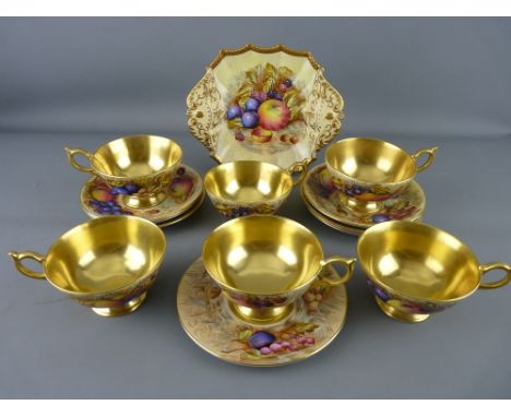 FOURTEEN PIECES OF AYNSLEY 'GOLD ORCHARD FRUITS' TEAWARE comprising six cups with gilt lined interiors, six saucers, a 16 cms