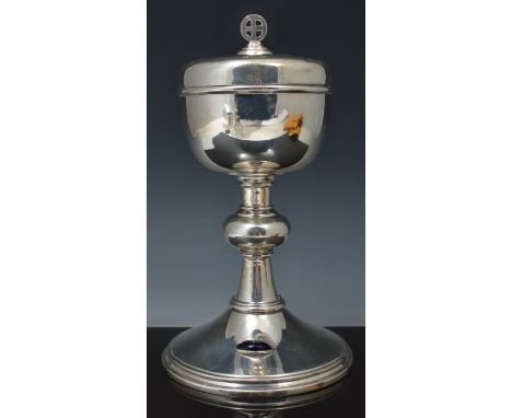 Silver chalice by F Osborne & Co., Limited, Birmingham 1930, domed lid with a blue enamel cabochon, 22cm.