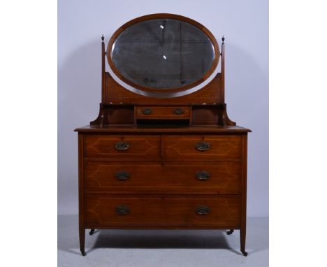 Edwardian inlaid mahogany dressing table, with boxwood stringing, oval bevelled plate, raised shelf with a drawer under, the 