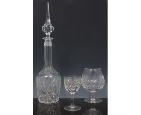 Cut glass decanter, slender form with a pointed stopper, 44cm, and other table glassware.