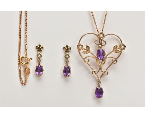 A YELLOW METAL PERIDOT AND SEED PEARL PENDANT AND CHAIN, openwork pendant of a heart form, centring on an oval cut amethyst, 