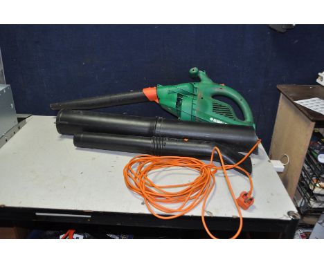 A BLACK AND DECKER GW250 GARDEN VAC/BLOWER with two spare pipes (PAT pass and working but switch intermittent) and a Homelite
