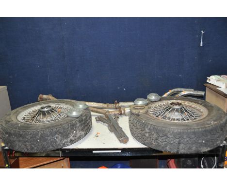 A PAIR OF POSSIBLY JAGUAR E-TYPE SPOKED WHEELS with a 2 3/4in splined spindle, 15in diameter fitted with one Michelin and one