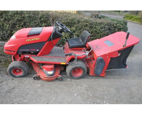 A COUNTAX HYDROSTATIC C600H RIDE ON LAWN MOWER with grass collection box and a sweeping attachment (engine starts and run, dr
