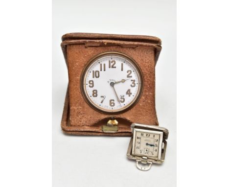 A SILVER TRAVEL CLOCK AND GOLIATH TRAVEL CLOCK, a small silver cased square travel clock, signed 'Ashworth Harrogate' Arabic 