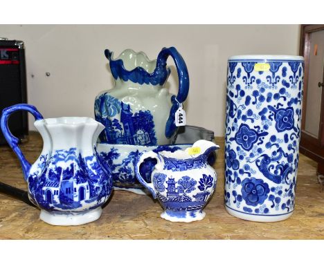 FIVE PIECES OF BLUE AND WHITE CERAMICS, comprising a Victoria Ware Ironstone wash basin (chipped and repaired) and jug, a sma