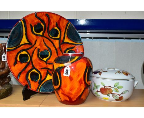 POOLE POTTERY ETC, COMPRISING A PEACOCK PATTERN CHARGER / SHALLOW DISH, approximate diameter 40cm, a Peacock pattern ginger j
