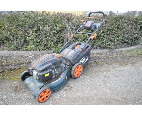A BMC LAWNRACER 20ESi SELF PROPELLED PETROL LAWN MOWER with a Wolf engine, electric start, auto choke (engine starts with ele