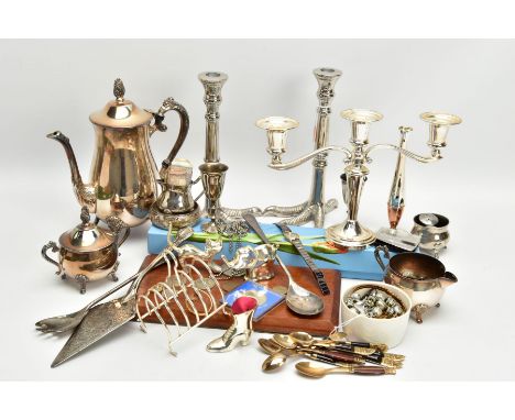 A BOX OF ASSORTED ITEMS, to include a pair of novelty white metal talon feet candlesticks, a silver-plated three-piece tea se