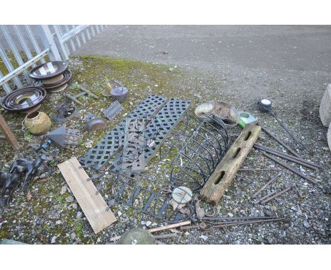 TWENTY EIGHT ITEMS OF GARDEN AND OUTDOOR METALWARE, including two Victorian boot scrapers, a small wall mounted feed trough, 