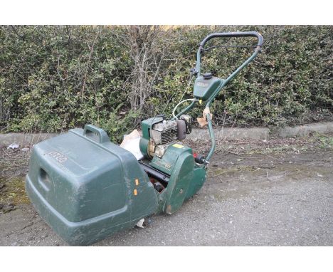 AN ATCO ENSIGN B17 PETROL CYLINDER MOWER with grass box and aerator attachment (engine pulls and starts)