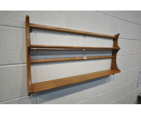 AN ERCOL BLONDE ELM PLATE RACK