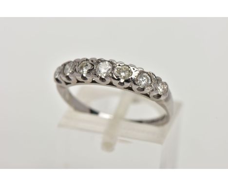 AN 18CT WHITE GOLD DIAMOND RING, designed with a row of seven round brilliant cut diamonds, estimated total diamond weight 0.