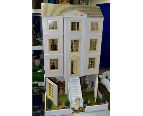 A LARGE MODERN WOODEN DOLLS HOUSE, modelled as a three storey Georgian style house with basement, front opening to reveal six