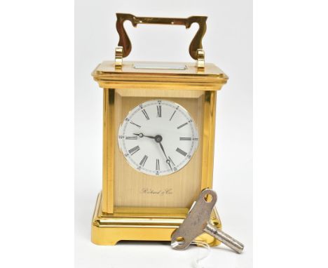 A FRENCH 19TH CENTURY CARRIAGE CLOCK, a white round face, black Roman numerals, signed 'Richard &amp; Cie', brass case fitted